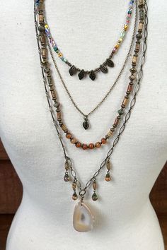 Five layer necklace with unique multi colored beads. A glass agate like pendant. Lobster claw closure. Vibe Tribe, Double Layer Necklace, Earthy Outfits, Layering Necklaces, Natural Jewelry, Hippie Vibes, Blouse Tank Top, Necklace Layering, Layer Necklace