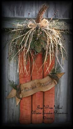 carrots are stacked on top of each other and tied together with burlock