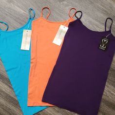 1 Urban Mangoz- Ocean Blue 1 Urban Mangoz- Coral 1 Simisue- Eggplant Purple These Are The Best Camisoles You'll Ever Have. The Material Is Soft With Just Enough Stretch To Them. The Sizes Are One Size. They Will Fit Up To Large Price Has Just Dropped For Quicker Sale Purple Tank Top With Built-in Bra For Summer, Trendy Purple Cami Tank Top, Trendy Purple Top With Spaghetti Straps, Trendy Purple Spaghetti Strap Top, Stretch Purple Camisole, Stretchy Purple Camisole, Purple Stretch Camisole, Purple Seamless Sleeveless Top, Purple Seamless Summer Tops