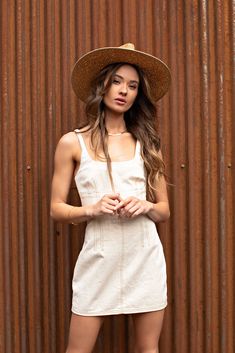 Our Palm Desert Panama fit in perfectly on our latest road trip photo shoot. Stunning, classic, chic - everything you've ever wanted in a hat. Featuring a molded crown with a pinched 10cm brim and hand woven straw, it's crystallized on the tone on tone ribbon with a simple Swarovski rivet. -Rancher style hat with a chill & casual vibe-Brim is flexible but holds its shape-Coordinating ribbon band-Pinched top-Great quality-- will last forever-This color actually goes with everything effortlessly-A Chic Fitted Flat Brim Panama Hat, Chic Fitted Panama Hat With Flat Brim, Chic Fitted Panama Hat With Curved Brim, Beige Panama Hat For Everyday Spring Wear, Chic Straw Hat For Everyday Summer Use, Chic Fitted Panama Fedora Hat, Everyday Beige Panama Hat For Spring, Fitted Panama Hat For Everyday Summer Wear, Chic Everyday Straw Hat For Summer