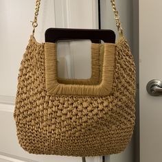 Very Cute Well Made Straw Shoulder Bag! Nwt. Has Wooden Handles And Nicely Lined Inside. One Compartment Brown Vacation Bag With Chain Strap, Brown Bags With Chain Strap For Vacation, Gold Square Shoulder Bag For Summer, Summer Gold Square Shoulder Bag, Summer Straw Bag With Chain Strap, Summer Rectangular Straw Bag With Chain Strap, Brown Shoulder Bag With Chain Strap For Vacation, Brown Shoulder Bag With Chain Strap For Summer, Rectangular Straw Bag With Chain Strap For Vacation