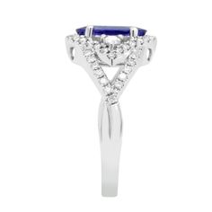 Fall In Love With This Stylish Piece Of Jewelry. A Fashionable Ring Designed Uniquely With 14k White Gold And Set With Round Cut Diamonds And Oval-cut Tanzanite, It Is An Expression Of Luxury. Product Information SKU ADG50924VS/1 Metal Type 14K Metal Color White Gold Ring Style - Primary Stone Gemstone Name Tanzanite Gemstone Species Zoisite No. Of Gemstones 1 Gemstone Shape Oval Gemstone Weight 2.15 Secondary Stone Gemstone Name Diamond Gemstone Species - No. Of Gemstones - Gemstone Shape Round Gia Certified Trillion Cut Diamond Ring For Formal Occasions, Gia Certified Trillion Cut Diamond Ring For Formal Events, Classic Heart Cut Diamond Ring With Accent Stones, Gia Certified Radiant Cut Ring For Formal Occasions, Gia Certified Radiant Cut Ring For Formal Events, Formal Birthstone Ring With Halo And Round Cut, Formal Birthstone Ring With Radiant Cut Center Stone, Diamond Heart Cut Ring With Halo Design, Elegant Gia Certified Trillion Cut Ring