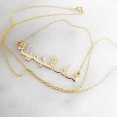 Our jewelry is always long lasting, beautiful, and of the highest quality. Our Persian (Farsi) and Arabic name necklaces are classic, unique pieces that are worth the investment. Personalize your necklace with this beautiful writing. We are happy to translate for you and we can't wait for you to fall in love with your very own piece. For our SCRIPT calligraphy version of this nameplate: https://etsy.me/2NMP7Qg DETAILS - Print calligraphy - Crafted with pure sterling silver and optional gold-plat Elegant Personalized Jewelry For Formal Occasions, Luxury Personalized Formal Necklaces, Luxury Nameplate Necklace For Formal Occasions, Formal Gold Plated Engraved Necklaces, Formal Engraved Gold-plated Necklaces, Elegant Gold Custom Necklace With Polished Finish, Formal Gold Plated Engraved Necklace, Luxury Custom Name Necklace In Sterling Silver, Luxury Custom Sterling Silver Name Necklace