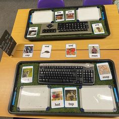 two computer keyboards sitting on top of a desk next to each other with matching pictures