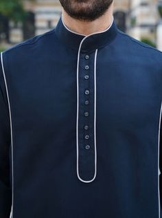 Classic Cotton Kurta For Semi-formal Occasions, Long Sleeve Kurta With Button Cuffs For Workwear, Navy Formal Top With Buttons, Navy Collared Top With Buttons, Fitted Kurta With Buttons For Semi-formal Occasions, Elegant Long Sleeve Kurta With Button Cuffs, Elegant Long Sleeve Kurta With Button Closure, Formal Long Sleeve Kurta With Buttons, Classic Long Sleeve Kurta With Buttons