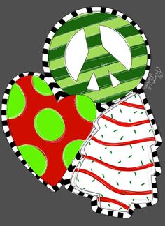 two heart shaped paper cut outs with green and red designs