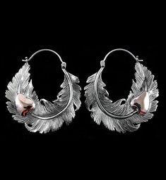 Sold in pairs (2pc).Size: 16G.Width: 50mm.Height: 58mm.11 grams each.Made from brass.Sterling silver clasp.Silver is not meant for long term wear.May oxidize under extreme moisture conditions. Ear Weights, Stretched Ears, Earrings Ear, Silver Feather, Upcycled Jewelry, Heart Earrings, Body Jewelry, Brass, Sterling Silver