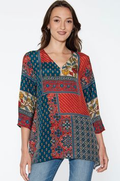 Our Ananda Tunics are made with 100% Cupro material, which is a luxurious, sustainable fabric that is produced from repurposed cotton waste in a closed loop system. This elegant tunic top has the look and feel of silk, but the lightness, easy care, and breathability of cotton.  The print designs are inspired by sari prints in rich jewel tone colors, and these fair trade tunics are available in S/M and L/XL size. Patterned V-neck Rayon Tops, Bohemian V-neck Tops For Layering, Multicolor V-neck Tunic For Fall, Cotton Patchwork V-neck Blouse, Cotton V-neck Patchwork Blouse, Cotton V-neck Blouse With Patchwork, V-neck Cotton Blouse With Patchwork, Flowy Viscose Tunic, Bohemian Cotton Blouse For Layering