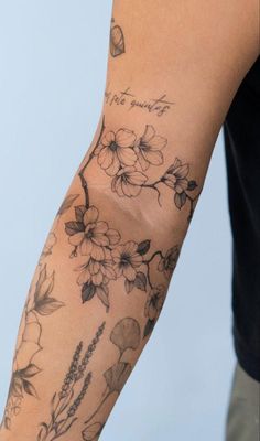 a person with a tattoo on their arm