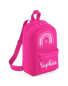 a pink backpack with the word sophiia on it and a rainbow in white