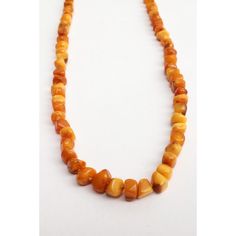 Do you also want to wear something nice and especially something that others don't have, this might be something for you.  This is an amber necklace which is strung with irregular pieces of amber, and beautiful abstract shaped beads.  This necklace is missing the clasp.  The necklace has acquired a beautiful patina over the years.  Length necklace 69 cm without clasp, 30 grams Amber Oval Beads Single Strand Necklace, Amber Single Strand Necklace With Oval Beads, Amber Single Strand Necklace For Jewelry Making, Vintage Amber Beaded Necklaces With Natural Stones, Amber Necklaces With Polished Oval Beads, Amber Oval Beads Necklace With Natural Stones, Amber Oval Beads Gemstone Necklace, Amber Necklace With Oval Gemstone Beads, Amber Bead Necklace