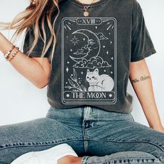 "Welcome to MindGardenx, we are so glad you've found us!  This vintage style Moon Tarot Shirt is trending right now as an oversized look. The comfort color style fabric is a rich heavyweight fabric that comes in weathered tones that get softer with age. We love the vintage look of this particular brand. Our tees are not only on trend but made with the best quality and comfort in mind. We know how it feels to get a cheap, scratchy, nasty t shirt so we have gone with what we think is the best. Com Coffee Skull, Tarot Shirt, Funny Tarot, Vintage Tarot Cards, Vintage Tarot, Zodiac Shirts, Comfort Colors Tshirt, Skull Shirt, Paramore