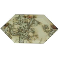 a white and brown marble hexagonal tile on a white background, with some green speckles in the center