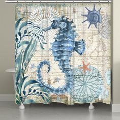 a blue seahorse tapestry hanging on the wall