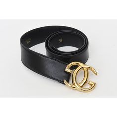 This 1980's Gucci black leather logo wide vintage belt is Italian and has the large gold plated GG's. It says 100/40 on the inside back. The GG's measure 2.5" W x 2.5" H as they are intertwined. The black belt strap is 44" L or wide x 1.85" H or deep. With the GG's logo included the entire belt width is 46.25" W or long. Says Made in Italy by Gucci. There are 3 original belt holes. Black Belt Buckles With Gold-tone Hardware For Business, Luxury Black Belt Buckles With Gold-tone Hardware, Luxury Black Belt Buckle With Gold-tone Logo Plaque, Formal Black Belt Buckles With Gold-tone Logo, Designer Black Belt With Gold-tone Logo Plaque, Designer Black Belts With Gold-tone Logo Plaque, Elegant Black Belt Buckle With Gold-tone Logo, Gold Belt With Logo Plaque For Formal Occasions, Gucci Designer Belt Buckles For Business