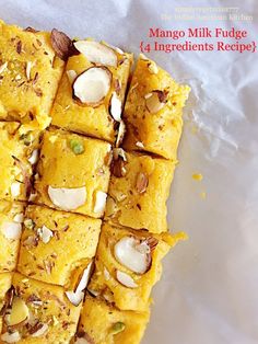 a close up of food on a piece of paper with text above it that reads mango milk fudge 4 ingredients recipe