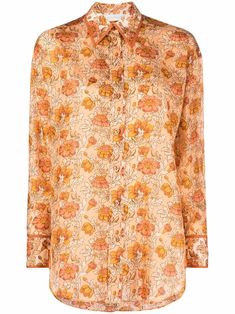 Amber silk floral-print silk shirt from ZIMMERMANN featuring grosgrain ribbon trim, classic collar, front button fastening, long sleeves, buttoned cuffs and curved hem. | Zimmermann Floral-Print Silk Shirt Luxury Patterned Button-up Tops, Luxury Long Sleeve Shirt With Multicolor Print, Luxury Long Sleeve Multicolor Print Shirt, Luxury Silk Blouse With Floral Print, Luxury Long Sleeve Floral Print Shirt, Luxury Floral Print Shirt For Fall, Luxury Cotton Silk Blouse Piece With Floral Print, Luxury Designer Multicolor Shirt, Luxury Casual Shirt With Floral Print