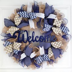 a welcome wreath with burlocks and polka dots