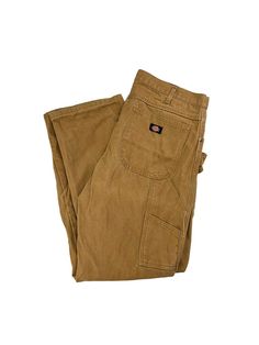 Vintage Dickies Canvas Workwear Carpenter Pants Size 37 MEASUREMENTS Size is based off measurements not the tagged size. Please refer to measurements. SIZE - 37 WAIST FLAT - 18.5" (measurement is multiplied by 2 to get the size) RISE - 12.5" INSEAM - 33" LEG OPENING - 9" Please note that due to the nature of pre-owned clothing; the size mentioned in the title may not be an accurate representation of the item's fit in accordance with modern sizing guides. Referring to the measurements will help t Workwear Pants With Patch Pockets And Standard Cut Leg, Fitted Brown Pants With Patch Pockets, Utility Full-length Pants With Welt Pockets, Fitted Work Pants With Patch Pockets And Straight Leg, Fitted Work Pants With Straight Leg And Patch Pockets, Fitted Tapered Leg Work Pants With Patch Pockets, Fitted Straight Leg Work Pants With Patch Pockets, Fitted Brown Bottoms With Patch Pockets, Workwear Pants With Pockets Standard Cut