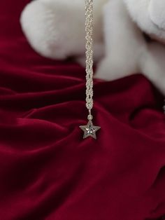 DUE TO THE CURRENT CANADIAN POSTAL STRIKE ARE PURCHASES WILL BE SHIPPED PUROLATOR OR SIMILAR. This sterling silver pendant features a delicate star charm hanging from an 18" link chain, creating a celestial gift perfect for birthdays. The elegant design captures the magic of the night sky, making it a meaningful accessory for everyday wear. Give the gift of celestial beauty with this stunning pendant, a piece that shines as bright as the stars themselves. Silver Star-shaped Charm Necklaces For Party, Silver Star Charm Necklaces For Party, Celestial Star Necklace For Party, Celestial Necklaces With Star Charm For Gift, Celestial Star-shaped Necklace For Party, Sterling Silver Star-shaped Jewelry With Adjustable Chain, Sterling Silver Star Jewelry With Adjustable Chain, Celestial Star Charm Necklace With Clavicle Chain, Silver Star Charm Necklace For Anniversary