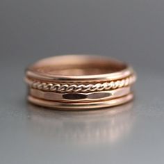 Twisted Rose Gold Stack Rings, Womens Stacking Rings, Rose Gold Ring, Gold Band, Gold Filled Stack Ring, Wedding Ring, Hammered Band This NEW! Gorgeous set of rings is one that you will love! This LittleGreenRoom Set Of 4 Rings is feminine, petite, and can be worn as stack rings, midi rings, or thumb rings. This listing is for 1 set of 4 rings (as seen in photos). This set includes (1) 1.3mm rose gold filled twisted band, (2) 1.3mm rose gold filled smooth bands, and (1) 1.3mm hammered rose gold Minimalist Gold Rings, Hipster Rings, Rose Gold Stackable Rings, Irish Wedding Rings, Rings Womens, Gold Wedding Bands Women, Rings Rose Gold, Ring Rosegold, Stack Rings