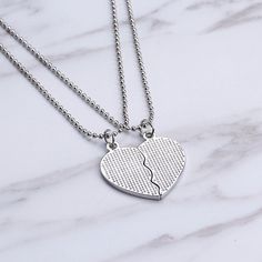 Material: Alloy + EnamelCharm Size: 3.2cm x 3.2cmChain length: approximately 40cm (17inches)Package includes: Pair of Necklaces + Exquisite Gift Box + Gift Card Friendship Heart Necklace With Adjustable Chain, Heart-shaped Adjustable Chain Necklace For Friendship, Heart-shaped Friendship Necklaces With Adjustable Chain, Heart-shaped Friendship Necklace With Adjustable Chain, Silver Charm Necklaces With Adjustable Chain For Friendship, Heart Shaped Silver Alloy Charm Necklace, Silver Clavicle Chain Necklace For Friendship, Heart-shaped Metal Necklaces For Friendship, Heart-shaped Metal Necklace For Friendship