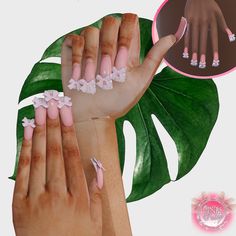 two hands with pink and white nail designs on them, one holding a green leaf