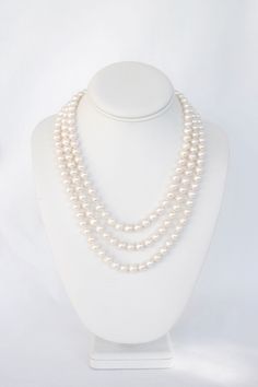 Lusterous, near round, cultured 8mm pearls with a decorative, classic, clasp. A modern heirloom piece with timeless elegance. Materials - 8 mm near-round AAA+ freshwater pearls, silk thread, sterling silver safety clasp SizeLength: approximately 18" ** This necklace is meticulously handmade by me in my FL home studio. Please allow 7-10 days for production.** Elegant Hand Knotted White Jewelry, Elegant Silver Hand Knotted Necklace, Elegant Silver Hand-knotted Necklace, White Hand Knotted Jewelry With Round Beads, Elegant Hand Knotted Silver Jewelry, Elegant Hand Knotted Silver Necklace, Elegant Hand-knotted Silver Jewelry, Hand Knotted White Round Bead Jewelry, Style Pearl Necklace