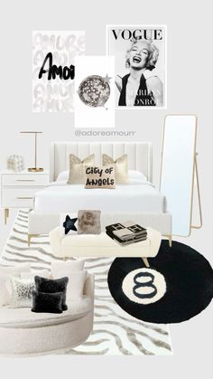 a white bedroom with black and white accessories on the bed, rugs, mirror, chair