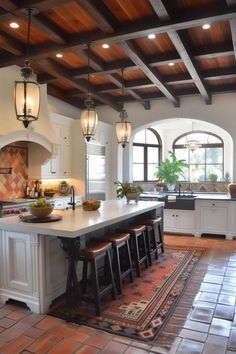 a large kitchen with an island in the middle