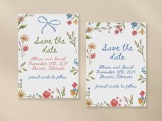 two wedding save the dates cards with flowers and blue ribbon on them, sitting next to each other