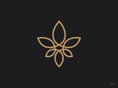 a gold leaf logo on a black background