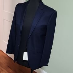 Alain Dupetit Navy Blue Two Button Suit Jacket Slim Fit 36 Short. Nice Quality With 3 Inside Pockets And Detail Stitching. Bought Three Of The Wrong Size Jacket For My Son And Didn't Realize It Until After The Return Window Closed. New With Tags. Also, Have Grey And Royal Blue Separately Listed. Fabric Tetron/Rayon Lined In 100% Viscose Jacket 2-Button Notched Lapels Custom Flap Pockets & Breast Pocket Lightly-Padded Shoulders Non-Functional Buttons On Sleeves Double Back Vent Office Outerwear Slim Fit With Single Button, Tailored Blue Blazer With Single Button, Tailored Single Button Blue Blazer, Blue Slim Fit Blazer For Business, Blue Flat Front Blazer For Work, Blue Slim Fit Blazer For Office, Blue Single Button Blazer For Business Casual, Blue Outerwear With Hidden Button Closure For Office, Navy Fitted Blazer With Suit Collar