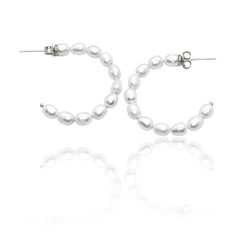 These freshwater pearl hoop earrings in sterling silver are a uniquely beautiful addition to any outfit. They are designed to elevate your style and add a touch of elegance to your look. Classic Silver Hoop Pearl Earrings, Everyday Silver Pearl Chain Earrings, Sterling Silver Hoop Pearl Earrings, Silver Small Hoop Earrings With Pearl Charm, Small Silver Hoop Earrings With Pearl Charm, Everyday Silver Hoop Earrings With Pearl Charm, Everyday Silver Earrings With Pearl Chain, Minimalist Silver Hoop Pearl Earrings, White Gold Hoop Earrings With Pearl Drop