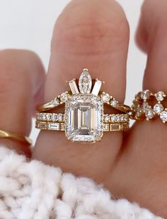 caption:1.70ct emerald cut diamond Trendy Engagement Rings Unique, Emerald Cut Engagement Ring Stack, Emerald Engagement Ring Stack, Emerald Cut Halo Engagement Ring, Stacked Engagement Ring, Emerald Cut Halo, Wedding Ring Sets Unique, Cz Rings, Band Ideas