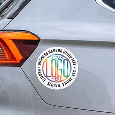 a sticker on the back of a car that says, your logo here is written in multicolored letters