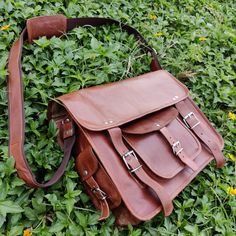 "Searching for a laptop bag to carry your laptop and daily essentials in a modern professional way? The perfect bag for you is here! We present this leather crossbody bag handcrafted from premium quality full-grain leather to give this natural vintage look. You can carry it to your office, school, college, or to small traveling trips. It is spacious enough to make it the best companion for your everyday usage. Product Details Colors: Brown Materials: Genuine full grain Leather Inside: Heavy Dura Purse Necessities, Leather Messenger Bag Men, Inch Bag, Laptop Bag Men, College Bags, Leather Laptop Bag, Briefcase For Men, Leather Satchel Bag, Messenger Bag Men