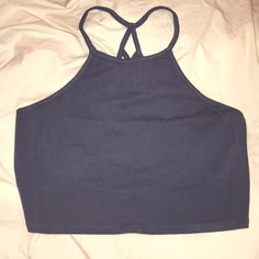 Blue Crop Top With Detailed Back Navy Casual Crop Top For Summer, Navy Stretch Tops For Summer, Navy Stretch Tops For Beach, Blue Cotton Casual Halter Top, Blue Casual Cotton Halter Top, Casual Blue Cotton Halter Top, Navy Fitted Summer Top, Blue Summer Crop Halter Top, Casual Blue Crop Top Halter