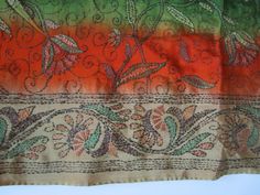 This is a beautiful Vintage Hand Embroidered Silk Saree. The colors are Green, Orange, Beige. Botanical, Floral Pattern Sari. Boho, Bohemian Party Wear, Wedding Sari. The Saree is 6 Meters Long. I have training in sewing and to me it looks like this whole 6 meters long fabric has been hand embroidered. That is very amazing. I can not start understanding how many hours it took to make. This item can be used as traditional a Sari or for home decor and sewing and craft projects. In my opinion it wo Bohemian Embroidered Fabric With Zari Work For Celebrations, Bohemian Wedding Blouse Piece With Resham Embroidery, Bohemian Wedding Blouse With Resham Embroidery, Orange Bohemian Dupatta For Eid, Bohemian Style Wedding Blouse Piece With Multicolor Embroidery, Bohemian Orange Dupatta For Eid, Bohemian Embroidered Fabric For Diwali Celebration, Green Bohemian Dupatta With Floral Embroidery, Green Silk Blouse Piece With Embroidered Border