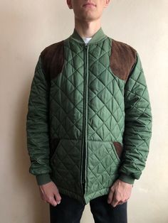 Belstaff Jacket / Belstaff Quilted Jacket / Size M / This vintage quilted jacket in good condition with signs of wear, thread broken on some stitches (last photo) - made in England - brand - BELSTAFF - ERA - 1980's - color - green - zipp at front- YKK - 2 outside pockets - 1 back pocket - 1 inside pocket - leather patches on shoulders, elbows and pockets - material - nylon, polyester - fit size - M  (watch measurements) FLAT Measurements: Shoulders : 45,5cm Chest (underarm to underarm) : 58cm Sl Brown Quilted Cotton Outerwear, Green Quilted Outerwear For Streetwear, Vintage Cotton Quilted Jacket For Fall, Vintage Quilted Jacket With Long Sleeves For Winter, Vintage Long Sleeve Quilted Jacket For Winter, Vintage Quilted Cotton Outerwear, Vintage Cotton Quilted Jacket For Winter, Winter Vintage Cotton Quilted Jacket, Vintage Cotton Quilted Winter Jacket