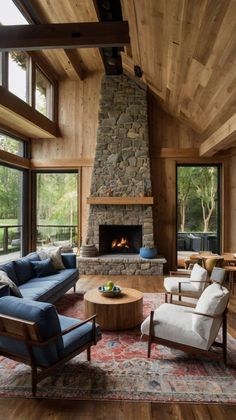 a living room filled with furniture and a fire place in the middle of a room