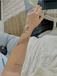 Leafy Wrist Wrap Tattoo, Plant Tattoos On Arm, Men Vine Tattoo Arm, Wrap Leaves Tattoo, Vines Tattoo Wrist, Olive Branch Arm Band Tattoo, Floral Vine Wrap Tattoo, Arm Wrapping Tattoos, Olive Branch Vine Tattoo