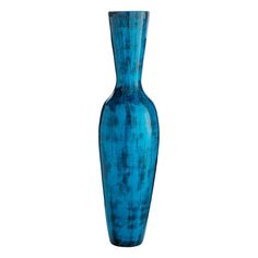 a tall blue vase sitting on top of a table