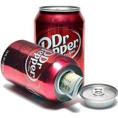 an open can of dr pepper soda next to a half - empty can of money