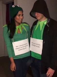 two people dressed up as the grinch and kermil