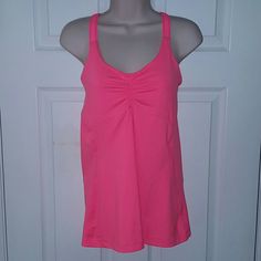 Adidas Cute & Comfy Athletic Tank Top W/Built In Bra, Performance "Climalite" Strappy Criss Cross Back, Tapered In Between Bust *Bright Pink, But It Is A Little Lighter Shade Of Pink Than Pics* Still Bright Pink!! I Tried To Get Pics As Accurate As Possible! Size: Medium Nwt: Brand New With Tags! 88% Polyester & 12% Spandex Super Fast Shipping!! Bundle & Save!! No Smoking, Buy It Now, Bundle Discounts Available, Reasonable Offers Accepted, No Trades! Thanks For Looking & Happy Shopping! Adidas Tops, Pink Adidas, Adidas Women, Bra Tops, Bright Pink, Light Shades, Athletic Tank Tops, Happy Shopping, Bra