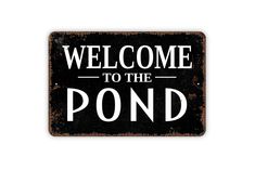 a black and white sign that says welcome to the pond