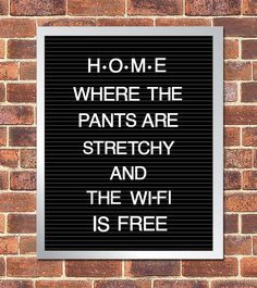 a sign that says ho me where the pants are stretchy and the wifi is free