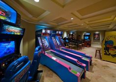 a room filled with video games and arcade machines