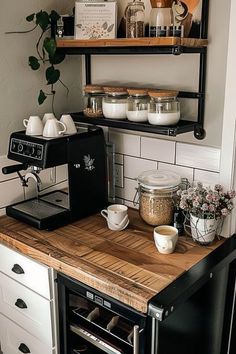 a coffee maker on top of a wooden counter